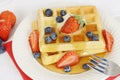 Top view blueberry strawberry syrup waffles Royalty Free Stock Photo