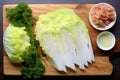 top view of board with sliced napa cabbage