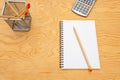 Top view book , calculator, glasses on wooden table Royalty Free Stock Photo