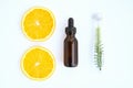 Top view, Bottle of natural oil and orange, Blank label package for mockup on white background.