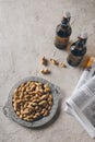 top view of bottles of beer peanuts and newspapers arranged Royalty Free Stock Photo