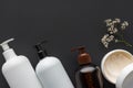 top view of bottles of cream and dried flowers