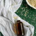 Top view of bottles with sesame seed essential oil Royalty Free Stock Photo