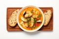 Top View, Bouillabaisse On A Wooden Boardon White Background