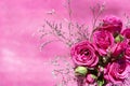 Top view of a bouquet of pink spray roses on a pink background Royalty Free Stock Photo