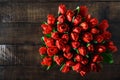 Top view bouquet of red tulips on dark wooden table