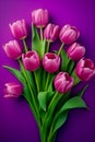 Top view bouquet of tulip flowers on violet with copy space background.