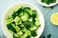 Top view bowl of chopped cucumber for salad