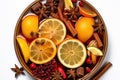 Top view of bowl of Christmas winter punsh with spices, citrus and berries on the white background