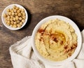 Top view bowl hummus with chickpeas. High quality and resolution beautiful photo concept