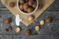 Top view of a bowl of macadamia nuts on a piece of burlap Royalty Free Stock Photo