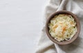 Top view of bowl of sauerkraut with cabbage on towel Royalty Free Stock Photo