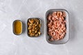 Top view of bowls with shrimps, mussels and garlic oil