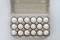 Top view of a box with a dozen and a half eggs isolated on a white background Royalty Free Stock Photo