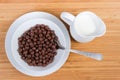 Top view of breakfast cereal chocolate balls and milk separately Royalty Free Stock Photo