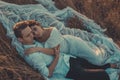 Top view of bride and groom kissing hugging couple. portrait of a couple in love guy and girl. In the grass, in a white wedding Royalty Free Stock Photo