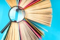 Top view of bright colorful hardback books in a circle. Royalty Free Stock Photo