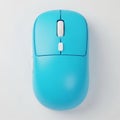 Top View of a Bright Cyan Wireless Computer Mouse with White Scroll Wheel and Buttons on a White Surface Royalty Free Stock Photo