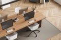 Top view on bright office room interior with four desktops Royalty Free Stock Photo