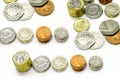 Top view of British currency coins as vertical and stack isolate on white background