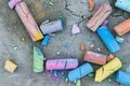 top view of broken colorful chalk pieces on concrete Royalty Free Stock Photo