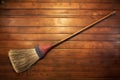 top view of a broom sweeping wooden floor with dust Royalty Free Stock Photo