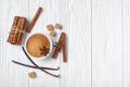 Top view of brown cinnamon granulated and cane cubes sugar with spices on white wooden background Royalty Free Stock Photo