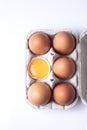 Top view of brown eggs on egg carton isolated on white background Royalty Free Stock Photo