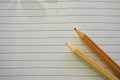 Pencils and blank paper with lines for short note Royalty Free Stock Photo