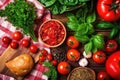 top view of bruschetta, tomatoes and scattered basil leaves on a table