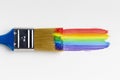 top view brush with rainbow paint. High quality photo