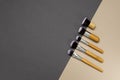 Top view of brushes for make-up on the grey and beige surface.Empty space Royalty Free Stock Photo