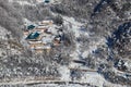 Top View. Buddhist monastery in the middle of a snowy forest in the winter taiga