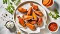 Top view buffalo wings in white plate, chicken, American food on the table, kitchen background