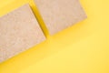 Top view of building thermal insulations made of ecologic materials isolated on yellow background Royalty Free Stock Photo