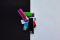 Top view of a bunch of different colors and designs of lighters. Gas, plastic disposable gas lighters. Lighters lie on Royalty Free Stock Photo