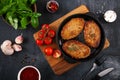 Top view on burger, cutlets in pan, which stands on cutting board. Royalty Free Stock Photo