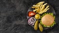 top view burger fries plate with pickles copy space. High quality photo Royalty Free Stock Photo