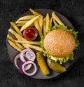 top view burger fries plate with pickles. High quality photo Royalty Free Stock Photo