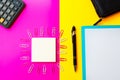 Top view Business concept. Office tools on pink and yellow background, Calculator, note paper, pen and clips. wallet Royalty Free Stock Photo