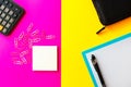 Top view Business concept. Office tools on pink and yellow background, Calculator, note paper, pen and clips. wallet Royalty Free Stock Photo