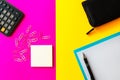 Top view Business concept. Office tools on pink and yellow background, Calculator, note paper, pen and clips. wallet Royalty Free Stock Photo