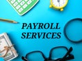 Top view business concept. The word PAYROLL SERVICES