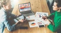 Top view.Business meeting.Two young business women sitting in meeting room at table and discussing. Royalty Free Stock Photo