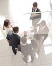 Top view. business partners stretching out their hands for a handshake Royalty Free Stock Photo