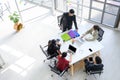 Top view of Business people group meeting in office. Aerial view with professional businesswomen and businessmen working in team Royalty Free Stock Photo