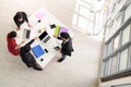 Top view of Business people group meeting in office. Aerial view with professional businesswomen and businessmen working in team Royalty Free Stock Photo
