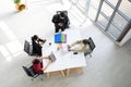 Top view of Business people group meeting in office. Aerial view with professional businesswomen and businessmen working in team Royalty Free Stock Photo