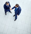 Top view, business people or handshake in modern office, finance company or investment startup for insurance deal. Men Royalty Free Stock Photo