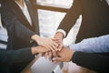 Top view of business people put hands together. Teamwork at office and business group concept Royalty Free Stock Photo
